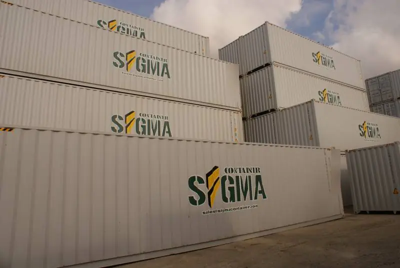 Stacks of white 40 foot containers with the Sigma Container logo