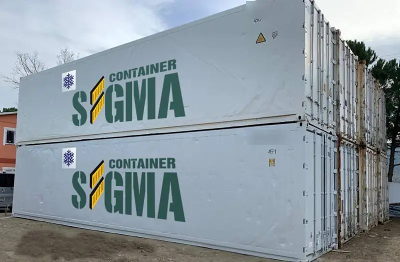 Two stacked white reefer containers with the Sigma Container logo