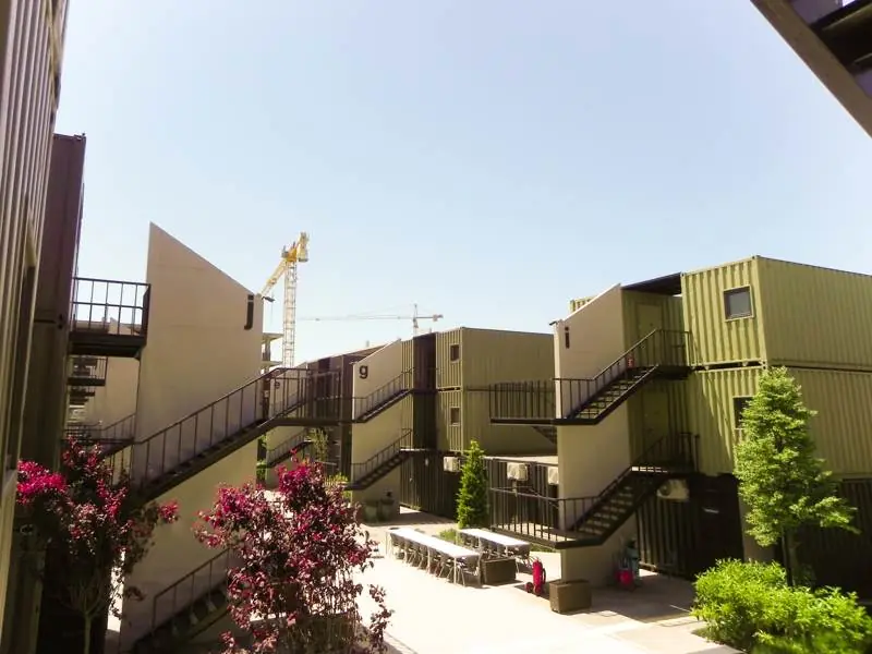Modified shipping containers converted into a multi-storey building